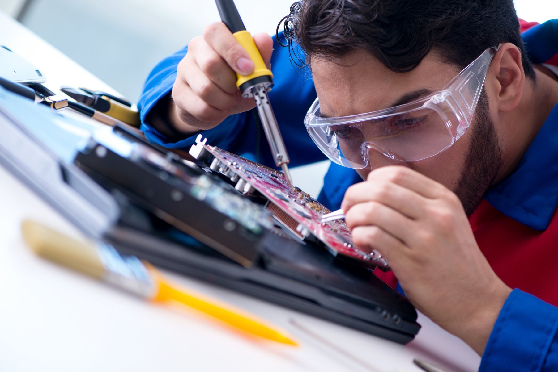 Repairman Working in Technical Support